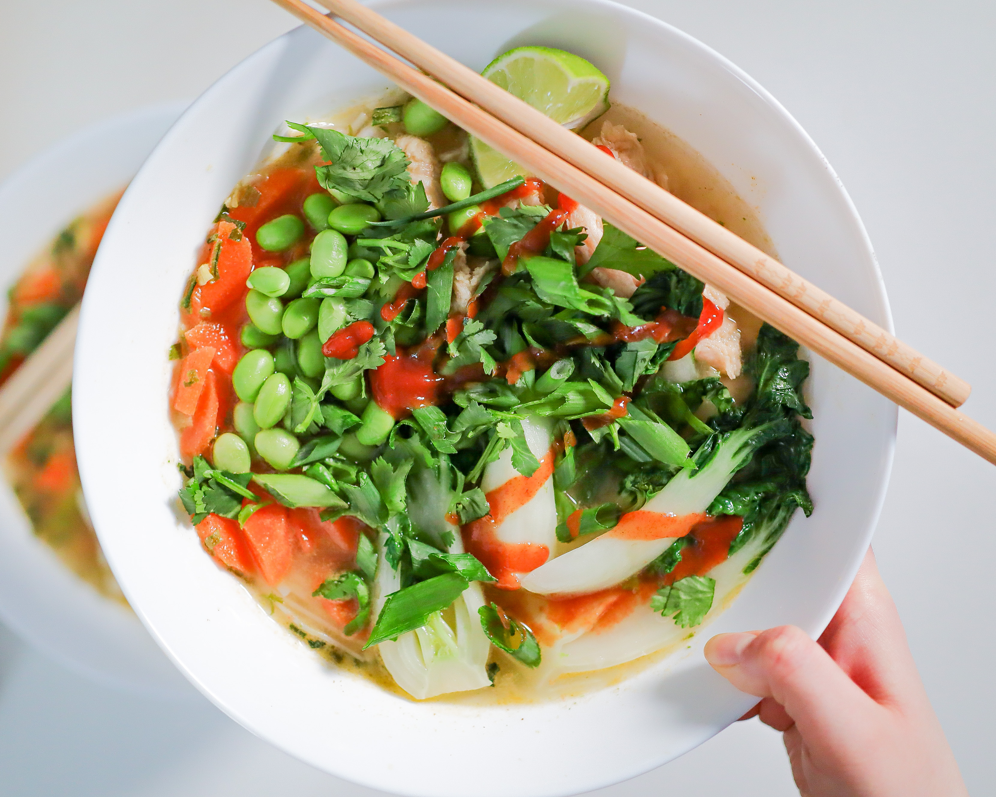 bowl of veggies in noodle soup.