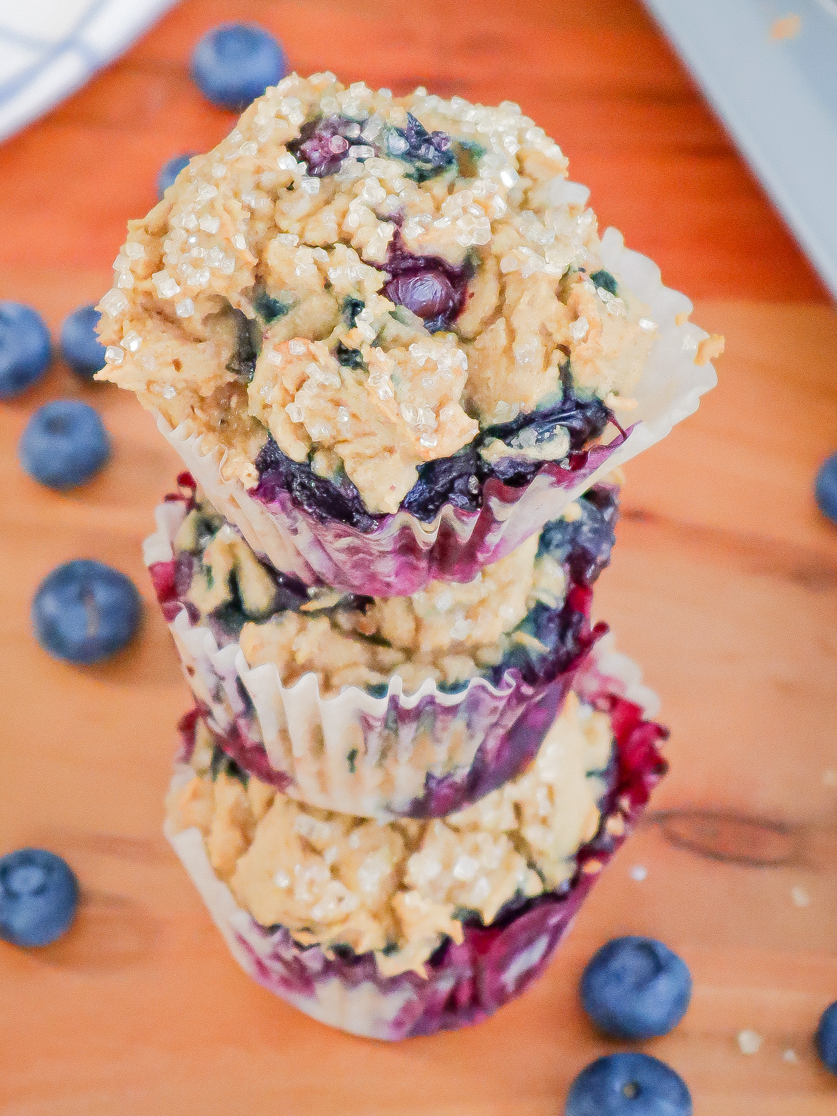 stack of three blueberry muffins
