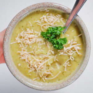 bowl of vegan broccoli & cheese soup