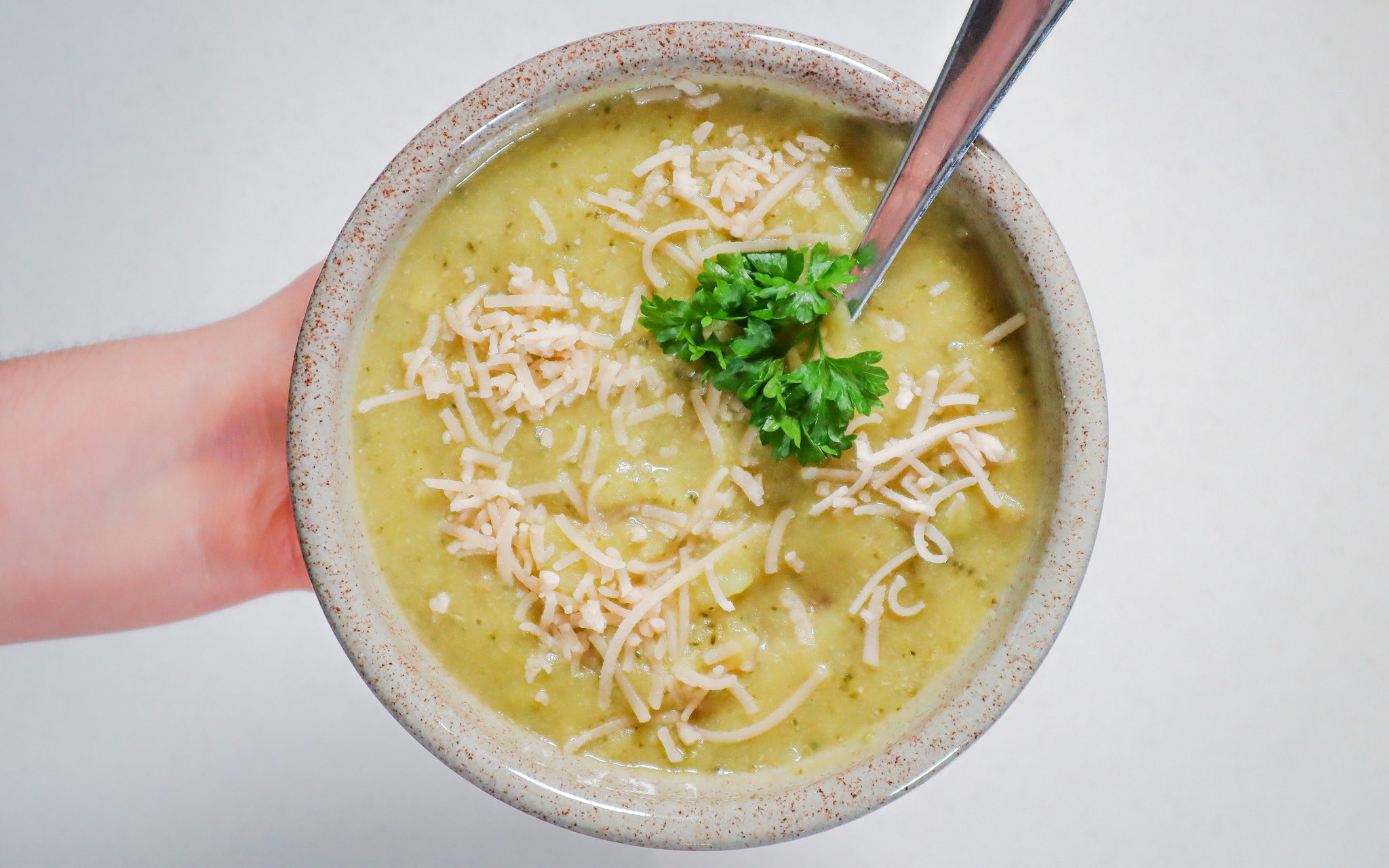 bowl of vegan broccoli & cheese soup