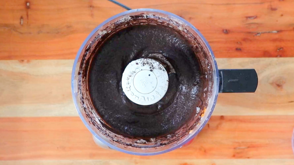 Food processor bowl with processed chocolate ice cream ingredients